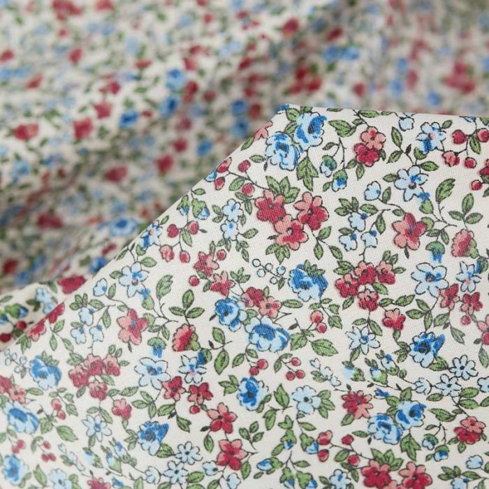 Tissu coton enduit fleurs - rose bleu ciel