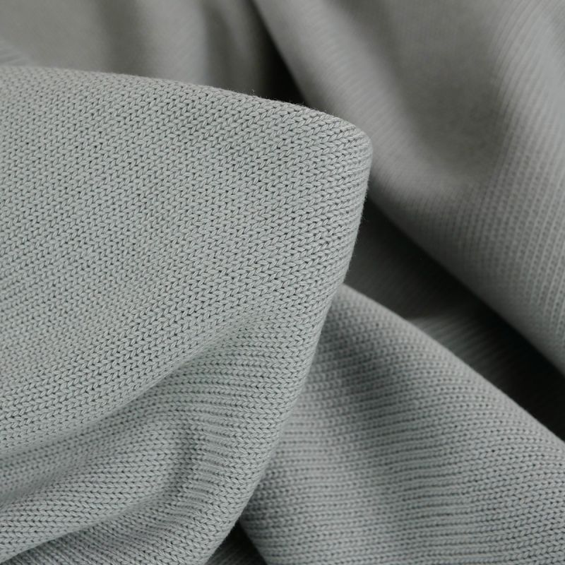 Tissu Maille Tricot Gaufré - 3% d'Elasthanne - 3 Coloris - Boulevard Tissus  Coloris 92 - gris clair