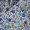 Tissu jersey fin fleurs Jollia - bleu x 10 cm