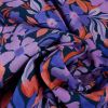 Tissu jersey fin fleurs violettes - bleu marine x 10 cm