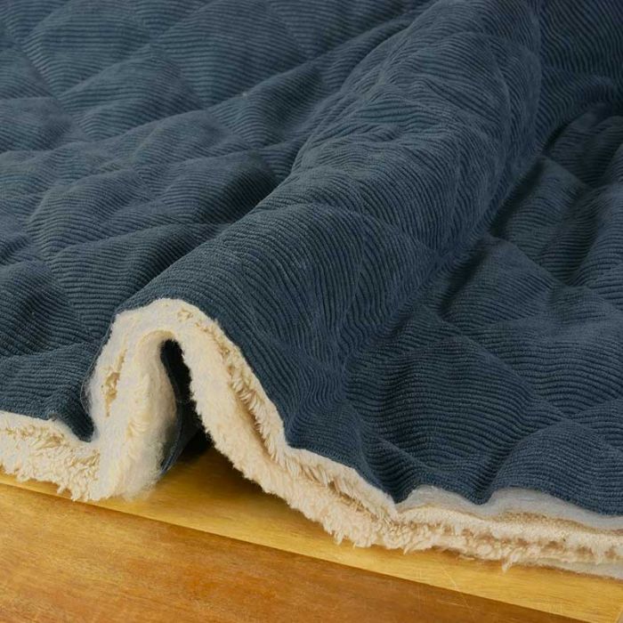 Tissu matelassé velours fausse fourrure - bleu denim x 10 cm