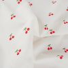 Tissu popeline coton motifs cerises - blanc x 10cm