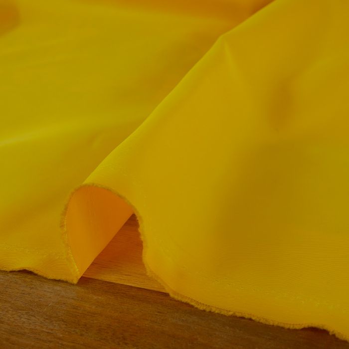 Tissu imperméable souple haute couture - jaune x 10 cm