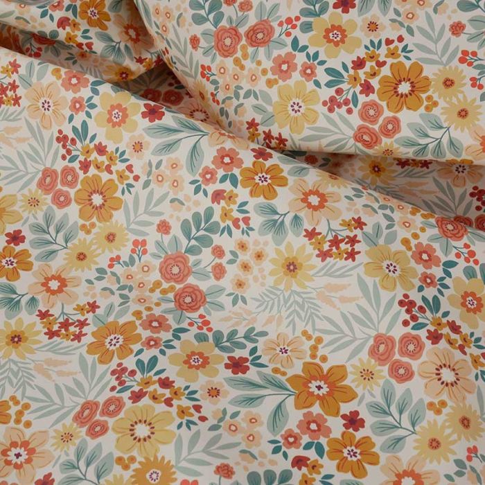 Tissu imperméable souple fleurs - orange x 10 cm