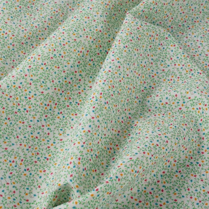 Tissu batiste coton fleurs haute couture - écru x 10 cm