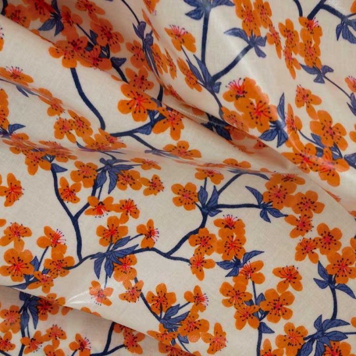 Tissu toile cirée fleurs Amalie Orange - Au Maison x 10 cm